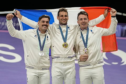 Men's BMX racing medal ceremony: Gold medalist Joris Daudet, silver medallist Sylvain Andre and bronze medalist Romain Mahieu